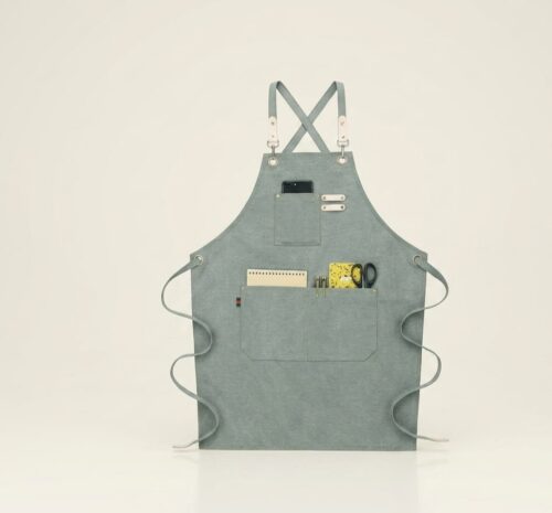 Unisex-heavy-duty-Chefs-work-apron-with-large-pockets-and-cross-back-design-made-from-durable-cotton-canvas.jpeg Unisex Chef Aprons